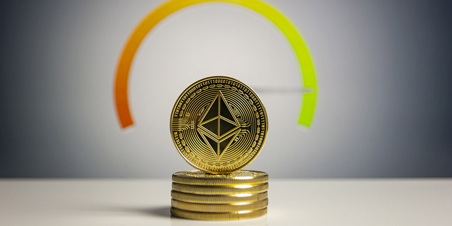 six pieces ethereum gold coins stacked on top of each other